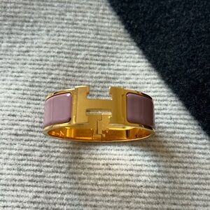 Hermes Clic Clac H bracelet in Gold and Mauve